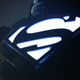 Supergirl teases her new space suit.